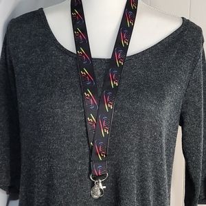 Nike long black and rainbow lanyard with charm